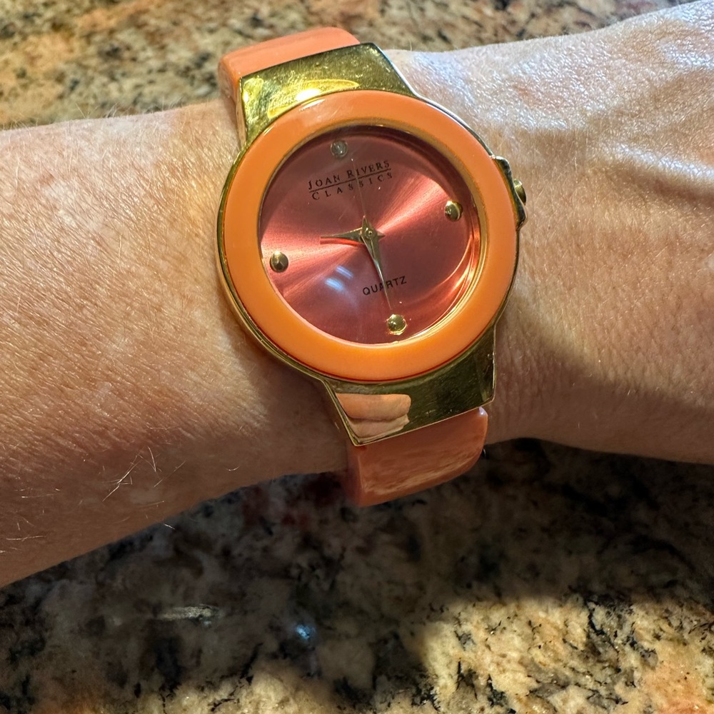 Joan Rivers fashion bracelet watch in coral with gold trim!
